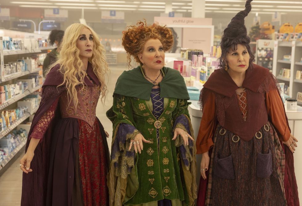 Sarah Jessica Parker as Sarah Sanderson, Bette Midler as Winifred Sanderson, and Kathy Najimy as Mary Sanderson in Hocus Pocus 2.