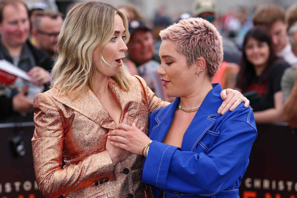 FLORENCE PUGH SAVES EMILY BLUNT FROM WARDROBE MALFUNCTION AT OPPENHEIMER PREMIERE