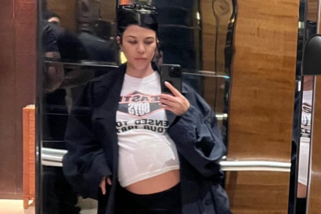 Kourtney Kardashian flaunting her Baby Bump