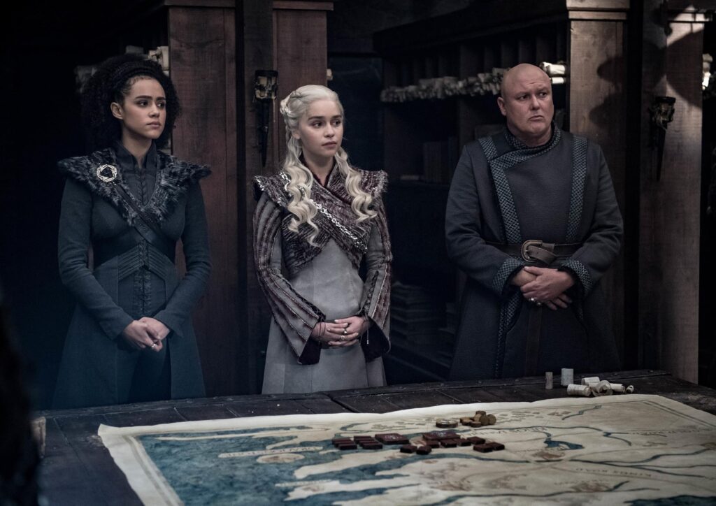 Conleth Hill, Nathalie Emmanuel, and Emilia Clarke in Game of Thrones (2011)
