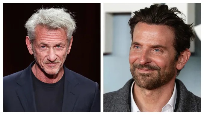 Two men side by side: left is an older man with grey hair in a dark blazer; right is a bearded man with dark hair wearing a gray blazer and white shirt.