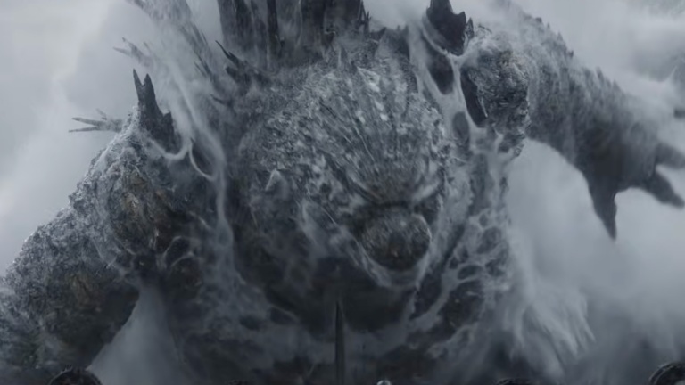 A colossal frost-covered monster lunges through the snow, with jagged icy spikes along its arms and body.