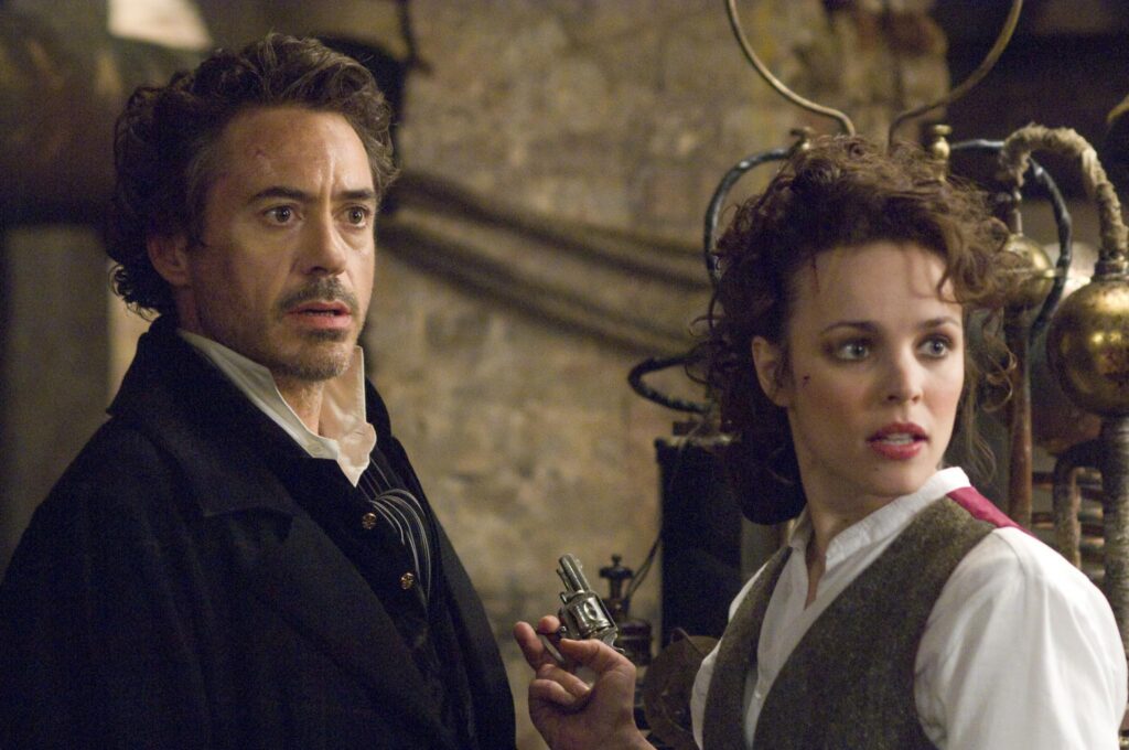 Robert Downey Jr. and Rachel McAdams in Sherlock Holmes (2009)