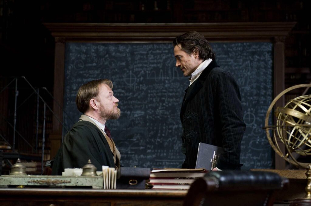 Robert Downey Jr. and Jared Harris in Sherlock Holmes: A Game of Shadows (2011)