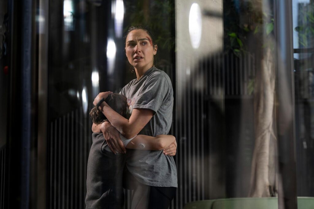 Rory Wilmot and Gal Gadot in The Runner (2026)
