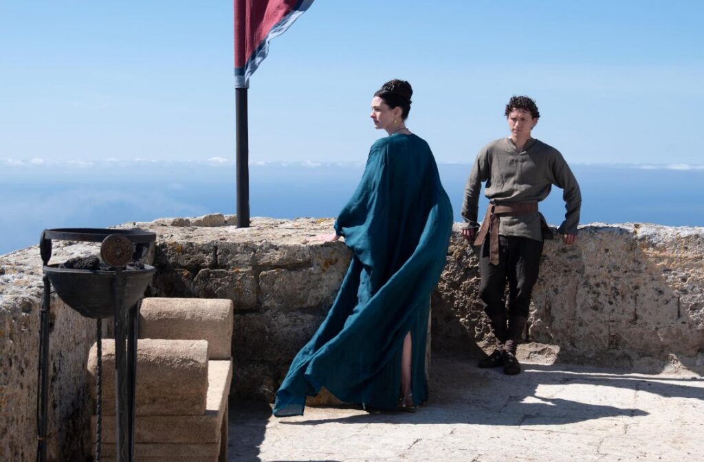 Anne Hathaway and Tom Holland in The Odyssey (2026)